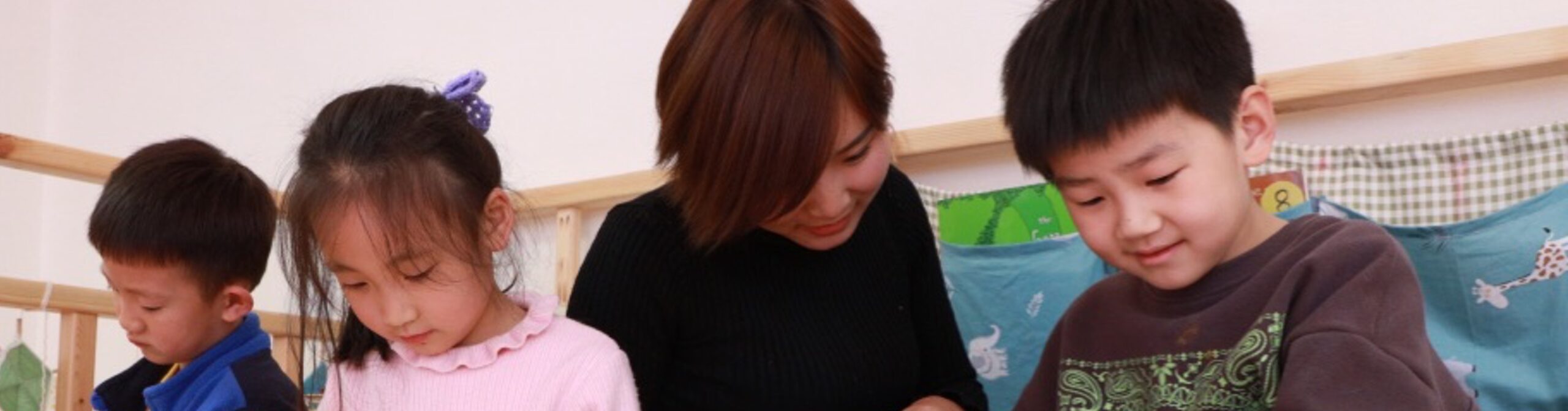 Children sitting on floor reading books